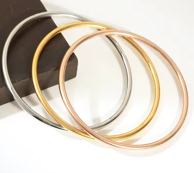 سوار نسائي من الفولاذ المقاوم للصدأ – 3 أجزاء مطلية بالذهب